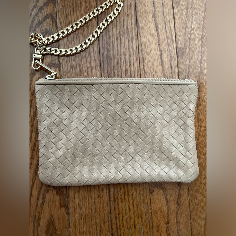 Cole Haan Wristlet. Weaved Front, 100% leather exterior, unbranded strap.